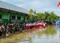 Semarak Upacara 17 Agustus Diwarnai Genangan Air