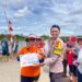 Bhabinkamtibmas Jelarai Selor Amankan Lomba Perahu Dayung