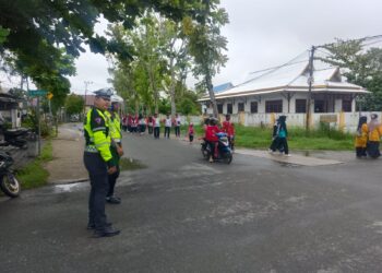 Sat Lantas Polresta Bulungan Amankan Jalur Jalan Sehat Peringatan Hari Guru di Tanjung Selor